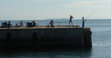 Do Exercise and Fishing on a pier