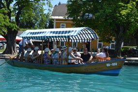 tourists on the boat in Slovenia