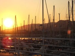 boats in the bay at sunset
