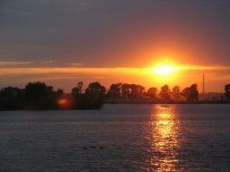 landscape of the kazan marina at the colorful sunset with reflection in the water