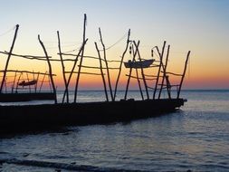 sunset over pontoon bridge in croatia