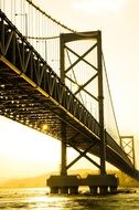 bridge in the rays of a bright sunset in japan