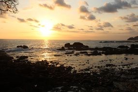 sunset in the clouds over the coast of Costa Rica