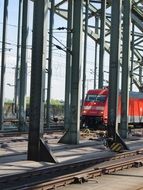 red train on the hohenzollern bridg