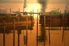 yellow glow of sunset over the harbor