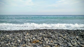 waves on a pebble beach