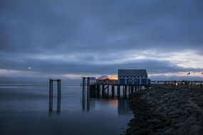 Ocean Market with the lights on the coast At Dawn