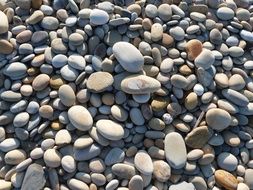 smooth stones on the beach under the sun