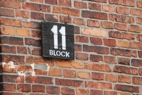 brick wall with a number in a concentration camp