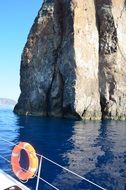 remote view of the rocky volcanic island of Milos