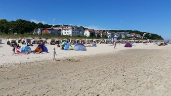 People on the sandy beach of Baltic Sea