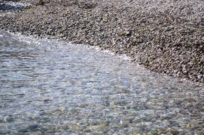 A lot of stones on a sea bank