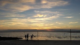 holiday on a coast at the sunset