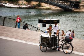 Hawker on Seine River embankment, france, Paris