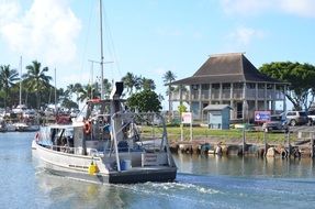 Tourist boat in the harbor in Hawaii