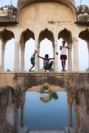 children playing in an indian temple