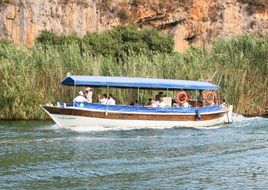 tourists on a boat in dalyan