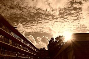 bright evening sun over the roof of the building