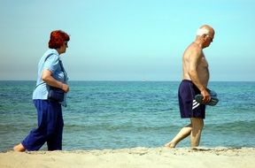 elderly people on the beach near the Baltic Sea