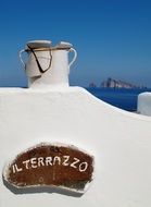 ilterrazzo inscription on white stone wall