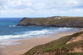 panorama view of a picturesque sandy beach in cornwall