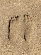 footprints in the sand close up