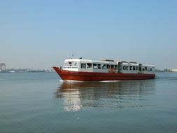 ship in calm water in the harbor