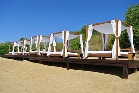 pavilions on sand beach in portugal