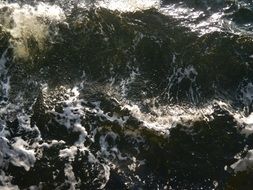 ocean waves with white foam close-up