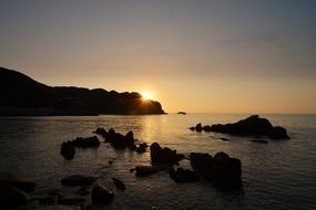 sunrise over the coast of the island