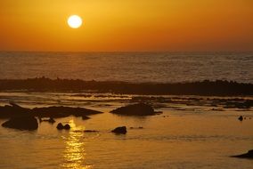 orange evening sky over the beach