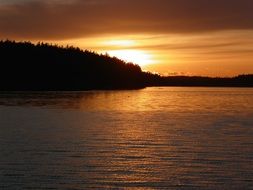 landscape of sunset over a ferry in washington