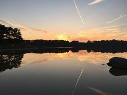 Sunset with the reflection on a water