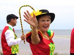 happy adult people in traditional Costumes at sea, Portugual