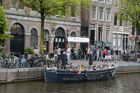 boat with people in amsterdam