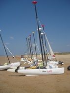white yachts on the beach