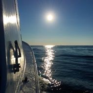 view from the boat to the sunrise over the ocean