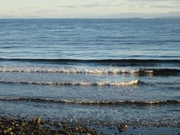 cascade of ocean waves on the shore