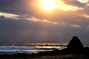 Cloudy sun rise over the ocean