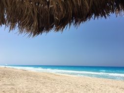 Relaxing on the beach near the water