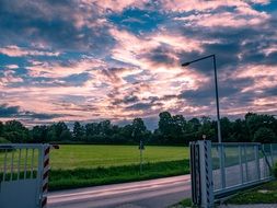 evening sky in clouds above a fire station