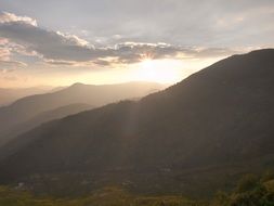 sunset rays over the mountains of China