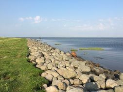 stone beach on green grass