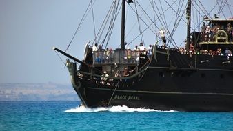black pearl pirate ship with tourists