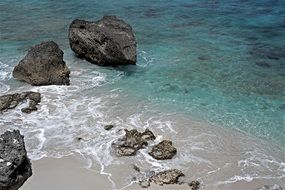 Rocks on the beach in the summer