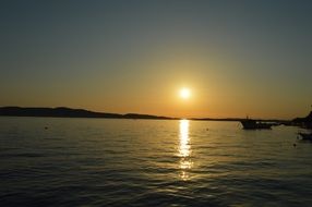 romantic sunset on the surface of the water