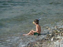child on lake constance