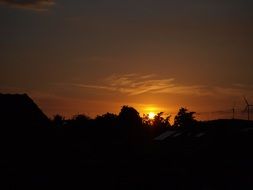 sunset over evening silhouettes