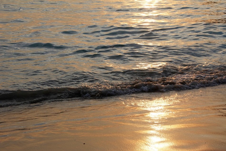Water on the beach under the sunshine