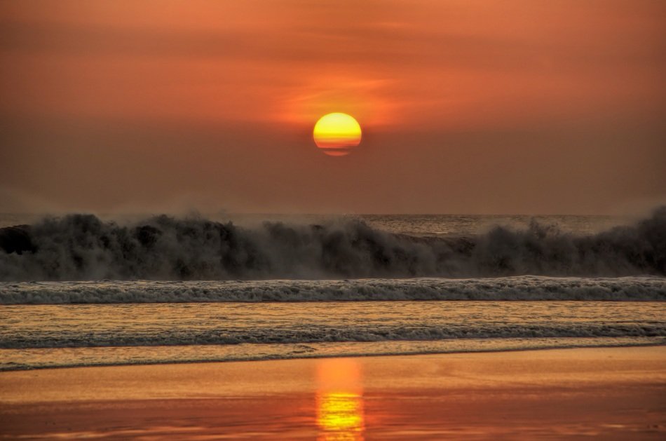 orange sunset over the beach in bali